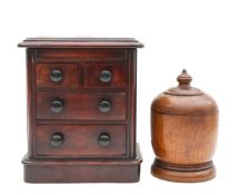 A Victorian mahogany apprentice chest of drawers, and a treen cup and cover