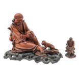 A Chinese carved rootwood figure of an emaciated Luohan