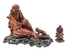 A Chinese carved rootwood figure of an emaciated Luohan