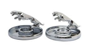 Two chrome Jaguar car mascot ashtrays