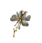An enamel and diamond set flower brooch