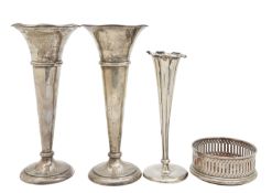 Two Edward VII and a George V silver vase, and a silver mounted coaster