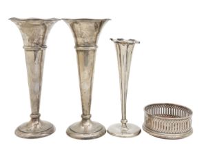 Two Edward VII and a George V silver vase, and a silver mounted coaster