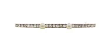 A diamond set bar brooch