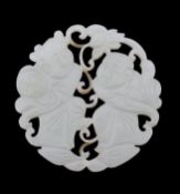 A Chinese pierced and carved jade roundel or pendant