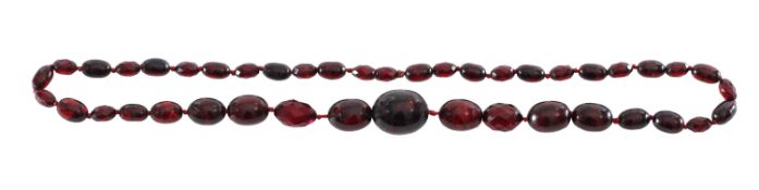 A cherry amber beaded necklace