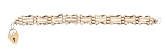 A 9ct gold three bar gate bracelet