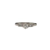 An Edwardian diamond and baguette ring