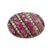 An oval ruby and diamond-set panel brooch
