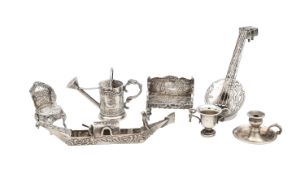 A collection of silver novelty miniatures