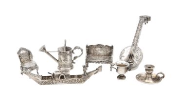 A collection of silver novelty miniatures
