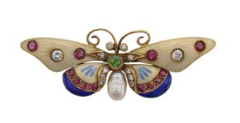 An enamel and gem set butterfly brooch