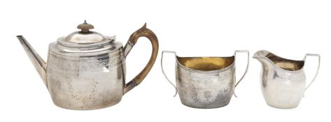 A composed Edward VII silver three piece silver tea serviced