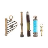 A collection of propelling pencils charms