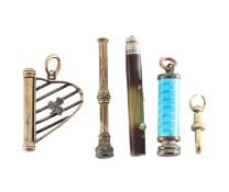 A collection of propelling pencils charms