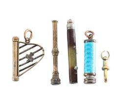 A collection of propelling pencils charms
