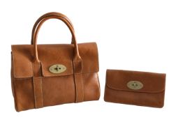A Mulberry 'Bayswater' oak leather handbag and a long locked purse