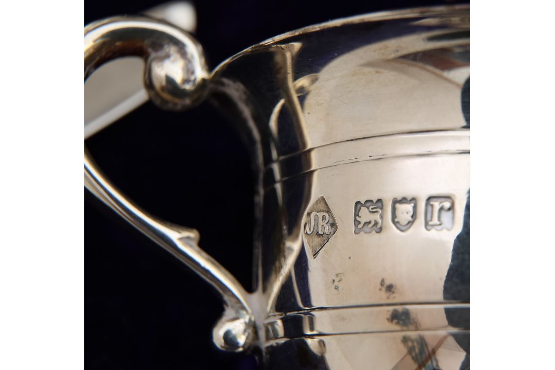 A cased George V silver cruet set, and two Victorian pepperettes - Image 2 of 3
