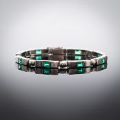 An Art Deco style articulated emerald bracelet