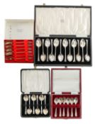 Four cased sets of silver teaspoons