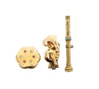 A gold and turquoise propelling pencil and two single ear clips