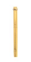 A Les Must de Cartier Trinity gold plated ball point pen