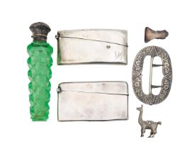 A silver scent bottle, two card cases, a shoe buckle and a llama