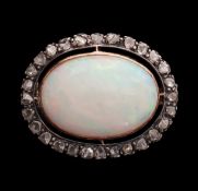An opal and diamond brooch