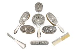 A Chinese silver nine piece dressing table set