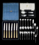 A collection of silver flatware