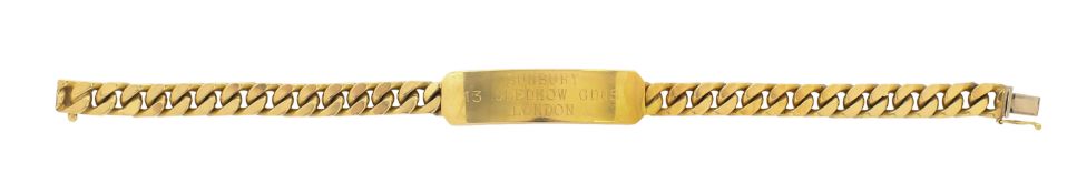 A heavy gold identity bracelet
