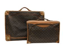 Two Louis Vuitton suitcases