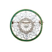 An enamel and diamond brooch