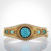A Victorian gold and turquoise hinged bangle