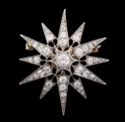 A Victorian old cut diamond star pendant or brooch