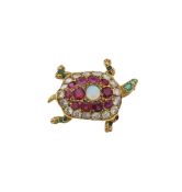 A diamond and gem set turtle brooch