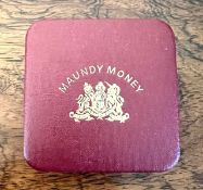 BOXED FOUR PIECES OF MAUNDY MONEY DATED 2002