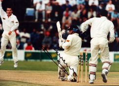 Darren Gough signed 10x8 inch colour photo pictured in action for England. Good condition Est.