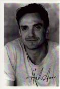 Hank Azaria signed photo card. Excellent condition . Good condition Est.
