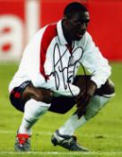 Ledley King signed 10x8 inch colour photo pictured while playing for England. Good condition Est.
