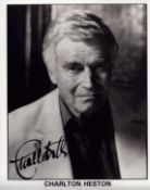Charlton Heston signed 10x8 inch black and white photo. Good condition Est.