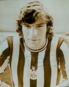 Football. Malcolm MacDonald, OM PC signed 7.5 x 6 inch sepia photo. Good condition Est.