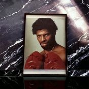 Leon Spinks signed 12x8 inch overall framed and colour photo. Good condition Est.