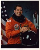 David C Leestma signed 10x8inch official NASA spacesuit photo. Dedicated. Good condition. All.
