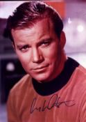 William Shatner signed 12x8 inch Star Trek colour photo. Good condition. All autographs come with