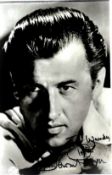 Stewart Granger signed 6x4 inch black and white photo. Dedicated. Good condition. All autographs