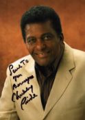 Charlie Pride signed 6x4 inch colour photo. Dedicated. Good condition. All autographs come with a