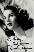 Deanna Durbin signed 6x4 inch black and white photo. Dedicated. Good condition. All autographs