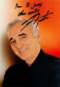 Charles Aznavour signed 7x5 inch colour photo. Dedicated. Good condition. All autographs come with a
