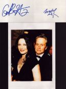 Michael Douglas and Catherine Zeta Jones signed separate 6x4 inch white cards with unsigned 11x8